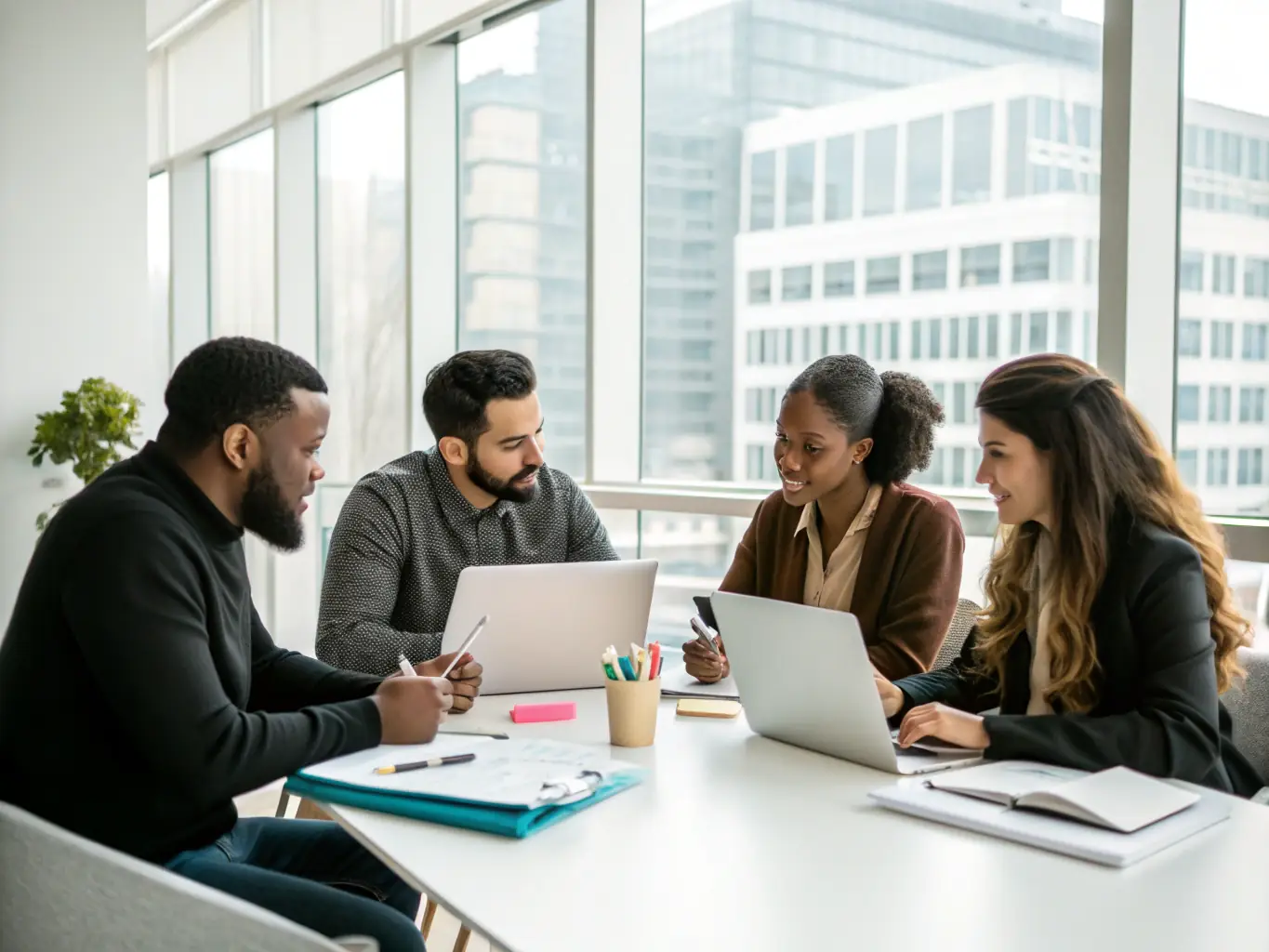 A diverse team collaborating on digital marketing strategies, showcasing social media management, content creation, and online branding efforts to strengthen digital presence.